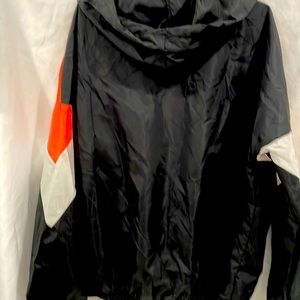 unused raincoats size Xxl but that is incorrect because it runs like M